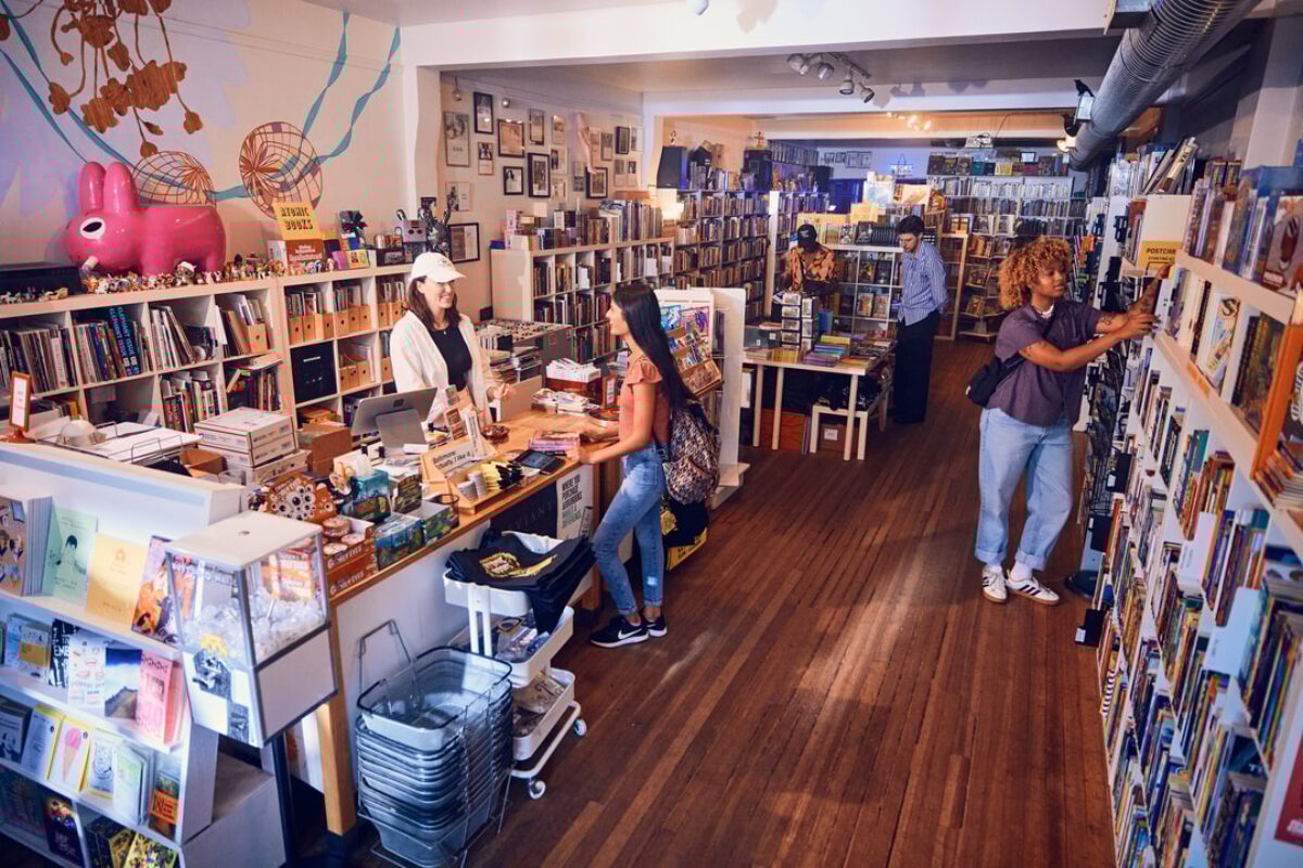 zoomed out shot of people browsing in a bookstore