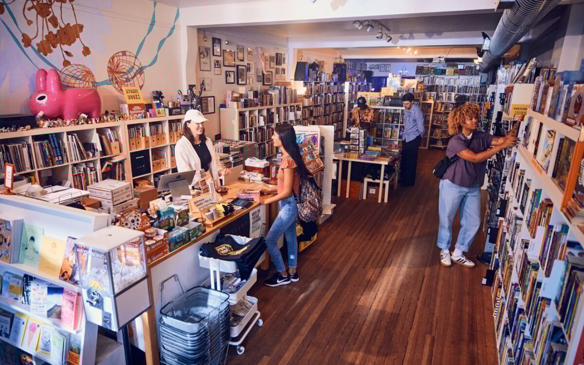 zoomed out shot of people browsing in a bookstore