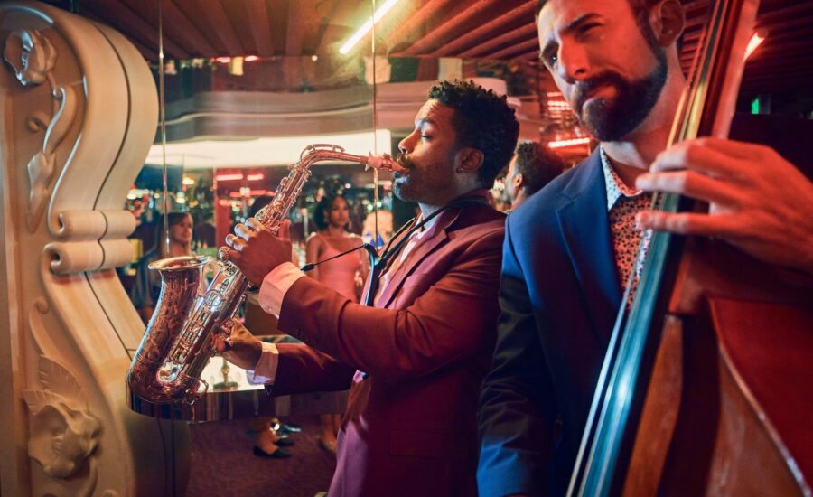 person skating at a skate park with the baltimore skyline in the background