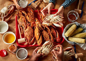 Eating blue crabs at Nick's Fish House in Baltimore.