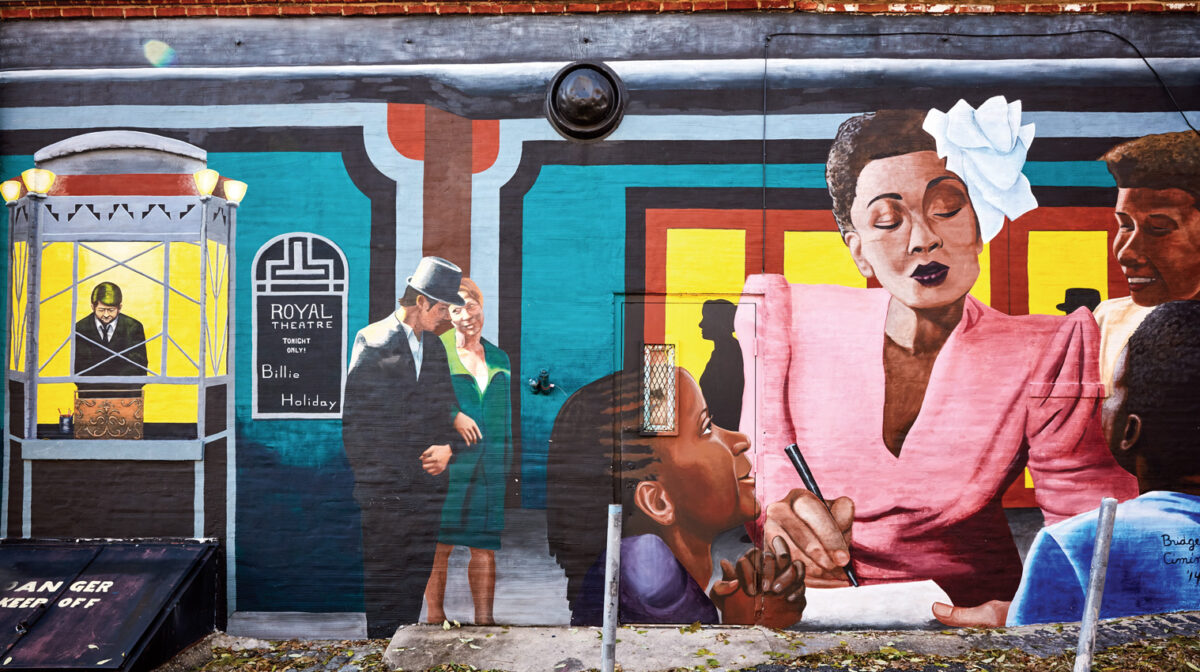 A mural of Billie Holiday is shown on the Royal Theater wall