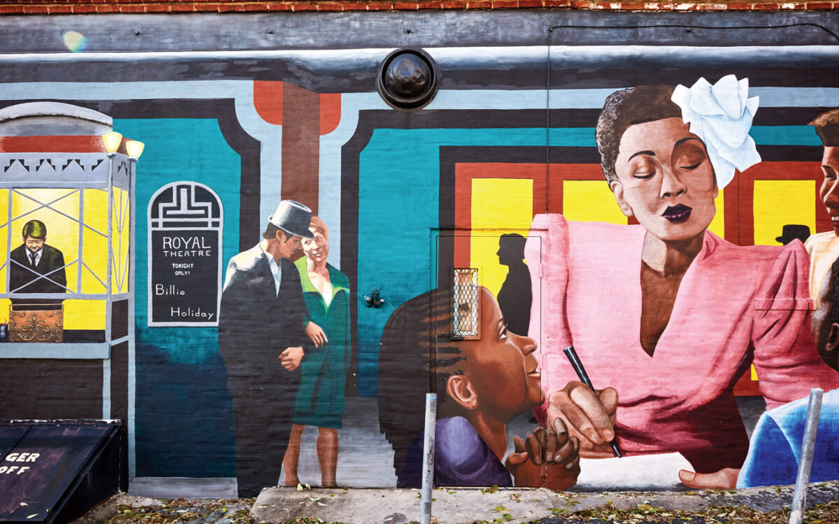 A mural of Billie Holiday is shown on the Royal Theater wall
