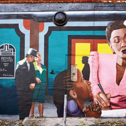 A mural of Billie Holiday is shown on the Royal Theater wall