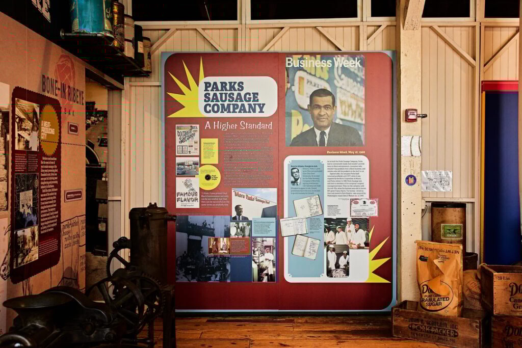 Signage detailing the significance of the Parks Sausage company