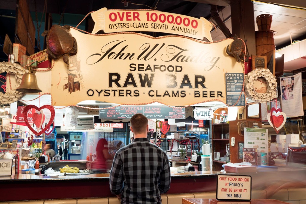 Customers ordering at Faidleys Lexington Market in Baltimore.