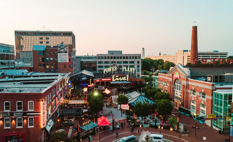 Close up of several colorful dragon boats on the water.