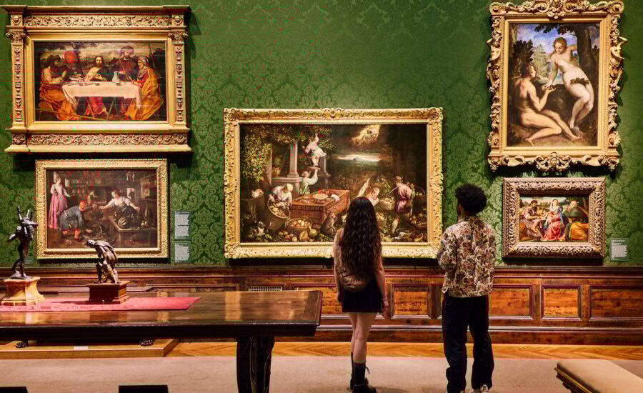 person skating at a skate park with the baltimore skyline in the background