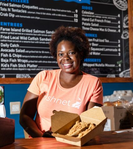 Woman at food counter