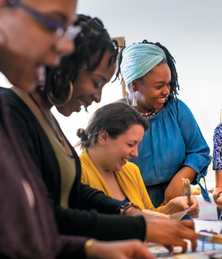 Dramamama event. Women painting.