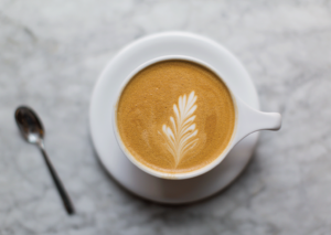 A latte with floral art