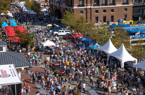 A crowd gathers in the streets of Fell's Point