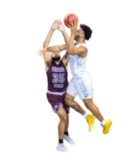 Two people playing basketball